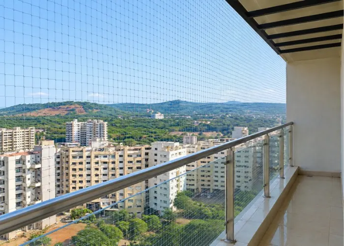 Pigeon netting installed on a residential balcony
